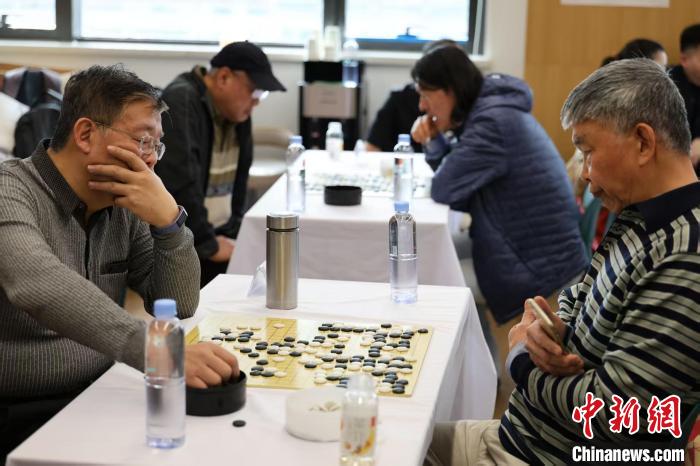 以竞技对抗与行业联谊并举的北京体育新闻界棋